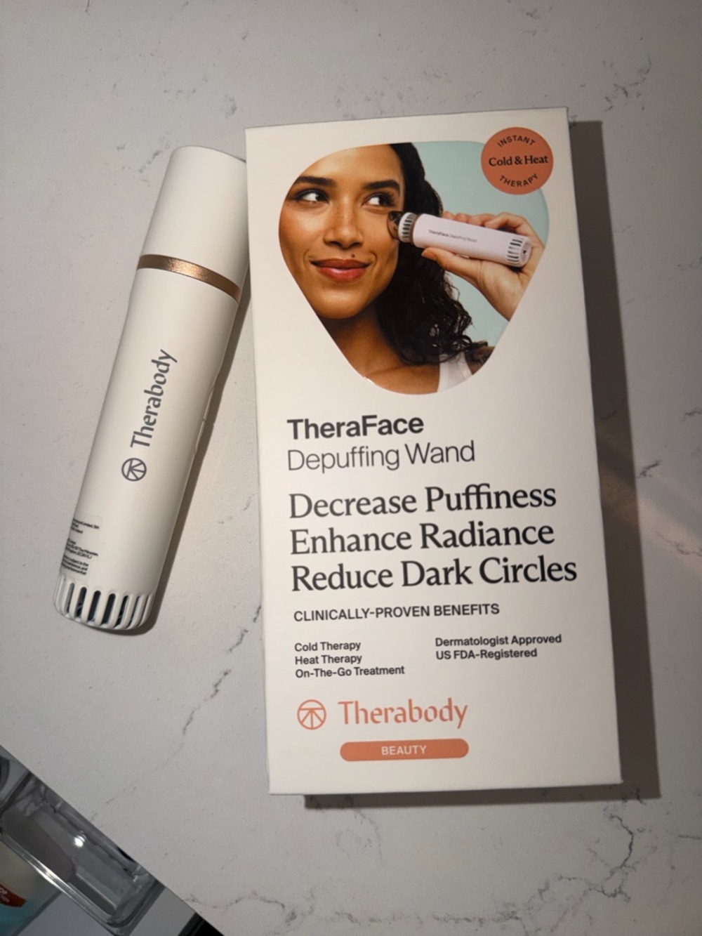 Therabody TheraFace Depuffing Wand in White